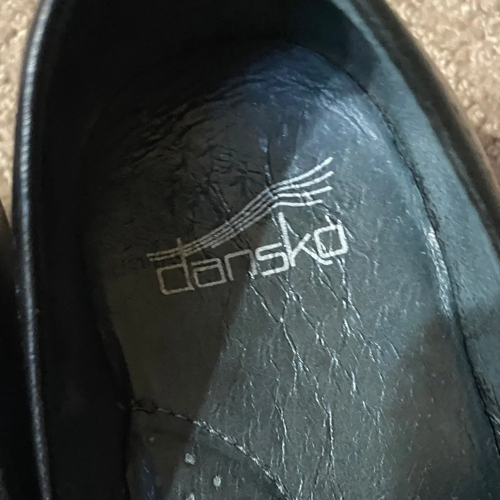 Dansko Black Leather Slip-On Size 36 (6) Loafers with Buckle Accent Clogs
